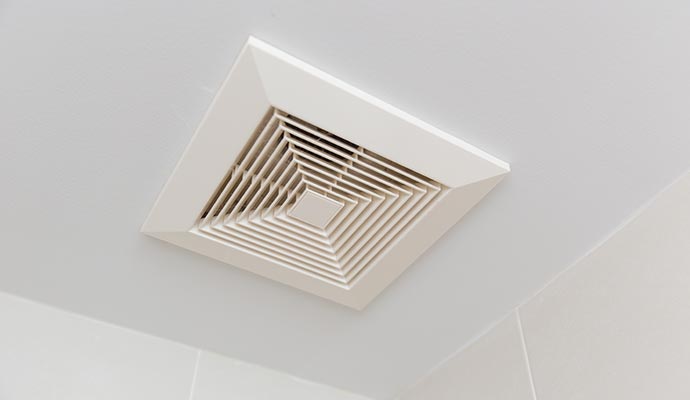 A clean ceiling mounted HVAC vent cover