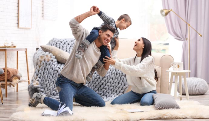 A happy family enjoying together in the living room