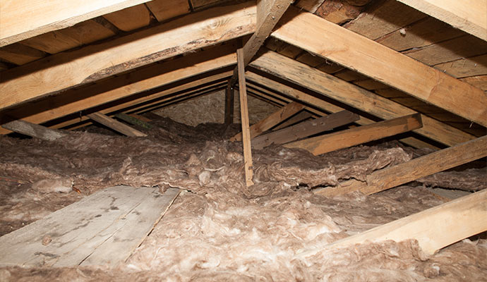 An interior view of a damaged attic space
