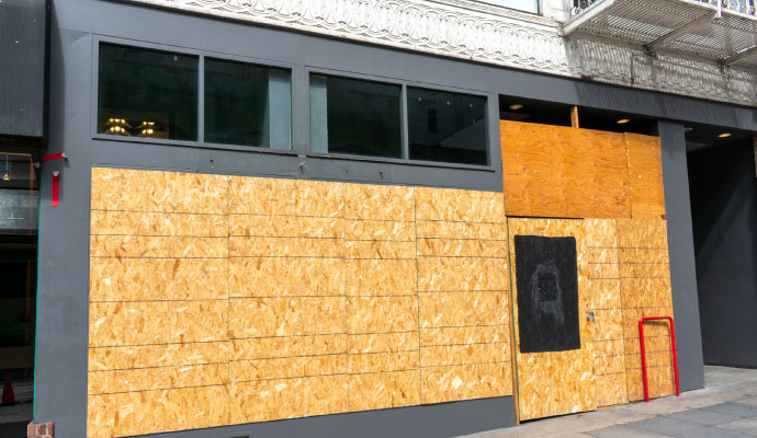Boarded-up exterior wall