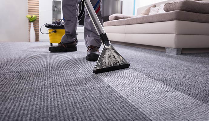 Carpet vacuum cleaning service by Cousino Restoration & Environmental
