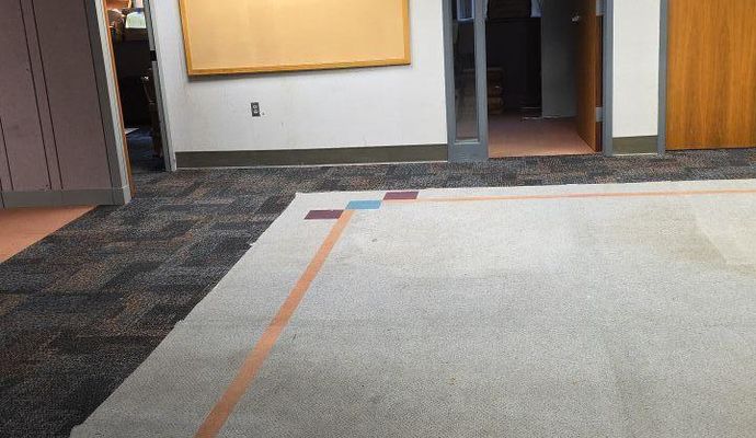 Clean carpeted office area water restoration