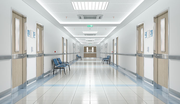 A clean and empty hospital corridor
