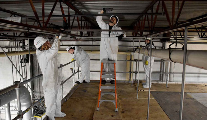 Professional team restoring commercial property