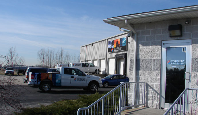 Cousino Restoration & Environmental office and vehicles
