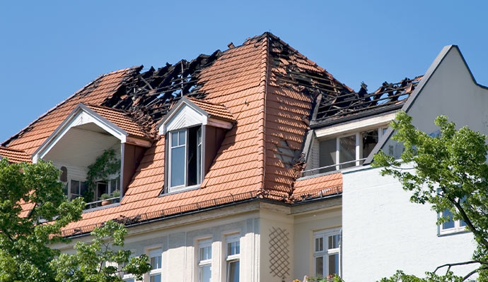 Fire damaged residential house roof