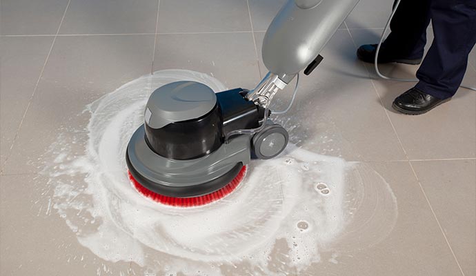 Grout cleaning service by Cousino Restoration & Environmental professional