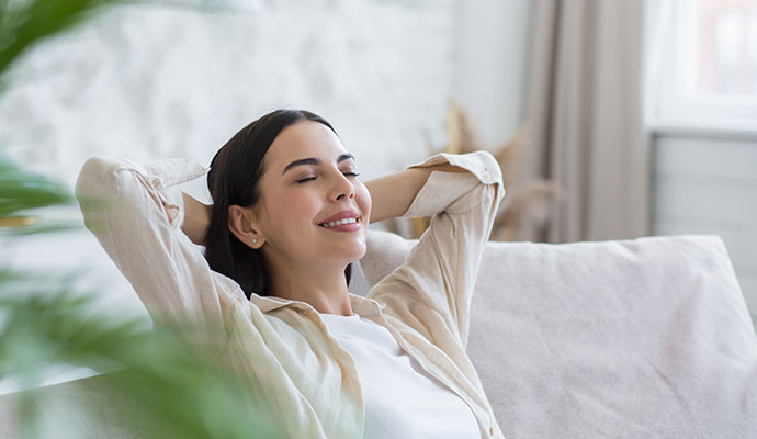 Woman relaxing on sofa
