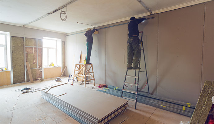 Professional team rebuilding home interior