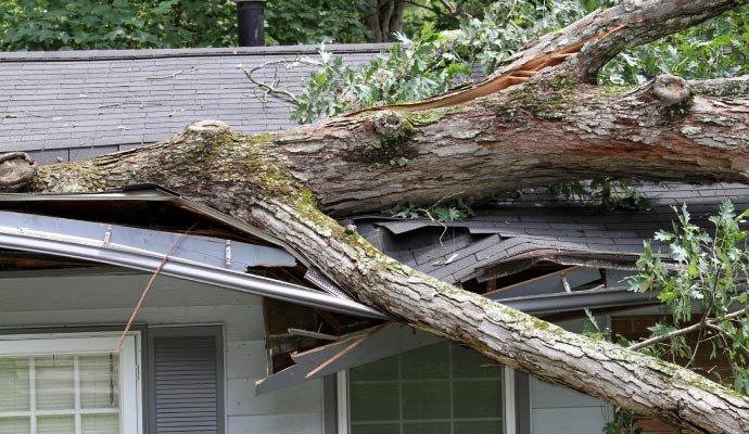 Extensive storm damage house roof