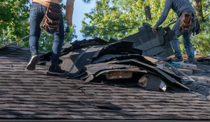 Storm damage roof repairing service by Cousino Restoration & Environmental 