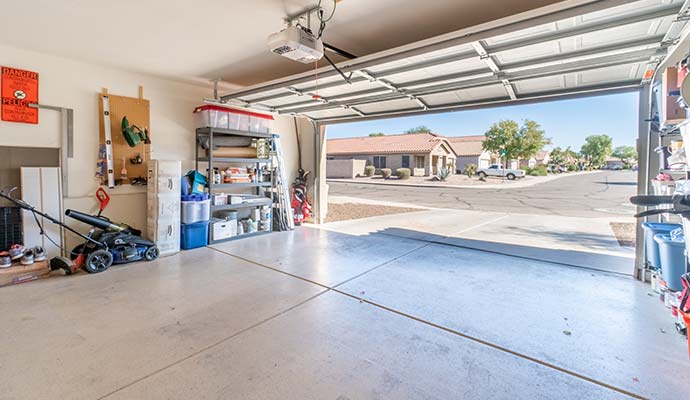 Clean residential garage floor and driveway