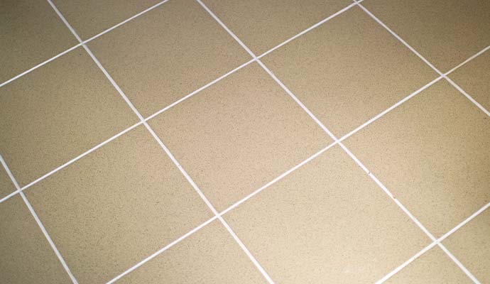 Clean tile and grout floor dried after water restoration