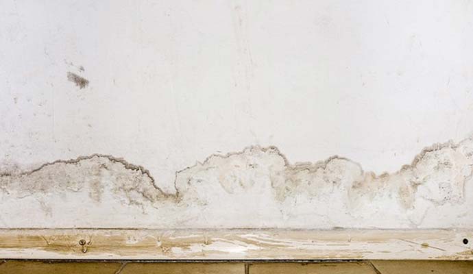 Water damaged drywall requiring structural restoration