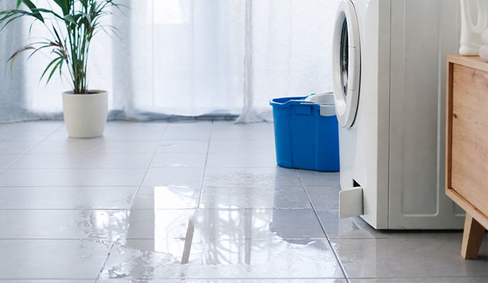 Water leaking from washing machine onto floor