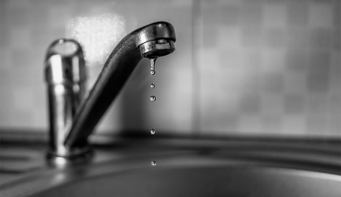 Water dripping from a leaky faucet
