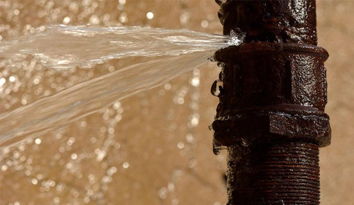 Water leaking from a broken pipe