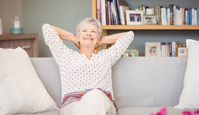 Woman relaxing on sofa